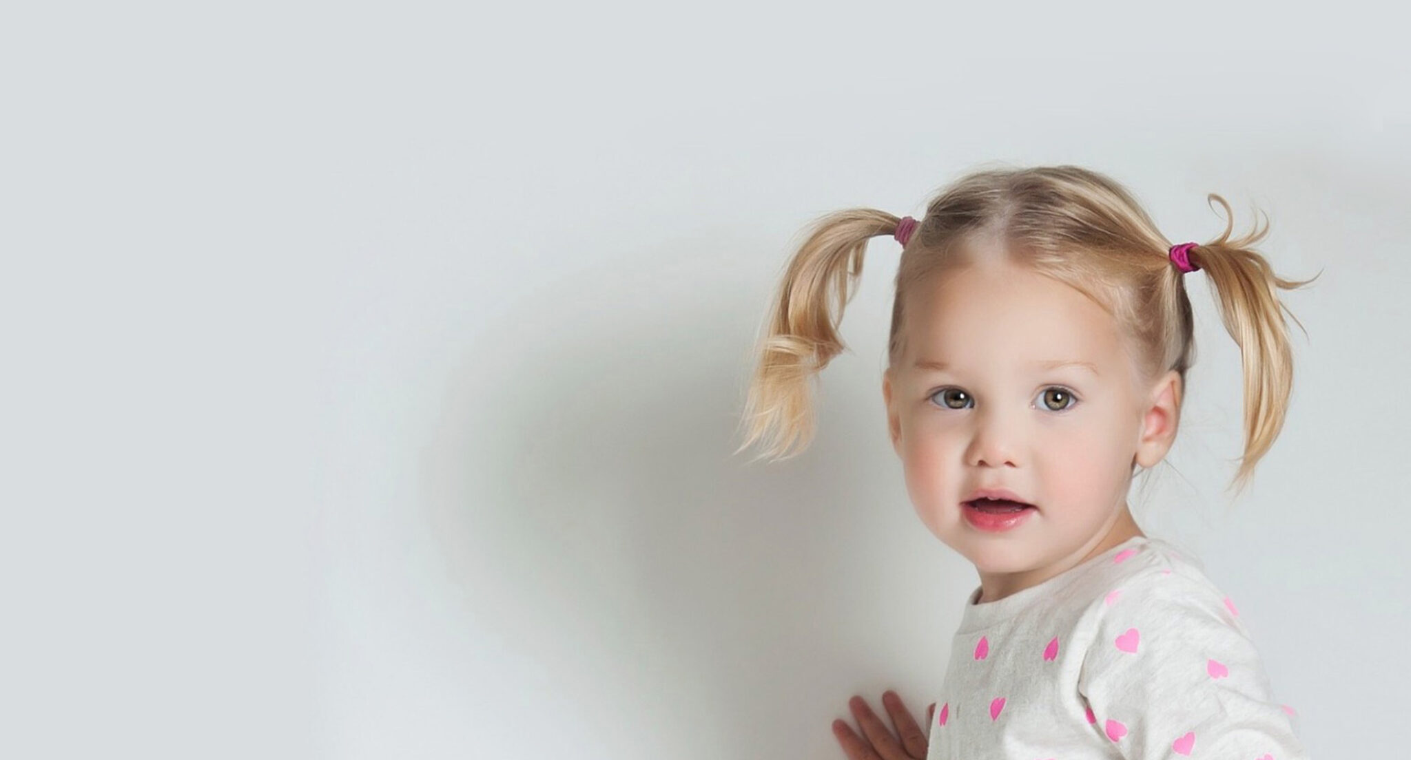 Mary - from abandoned baby to adopted daughter. Blonde toddler with pigtails.