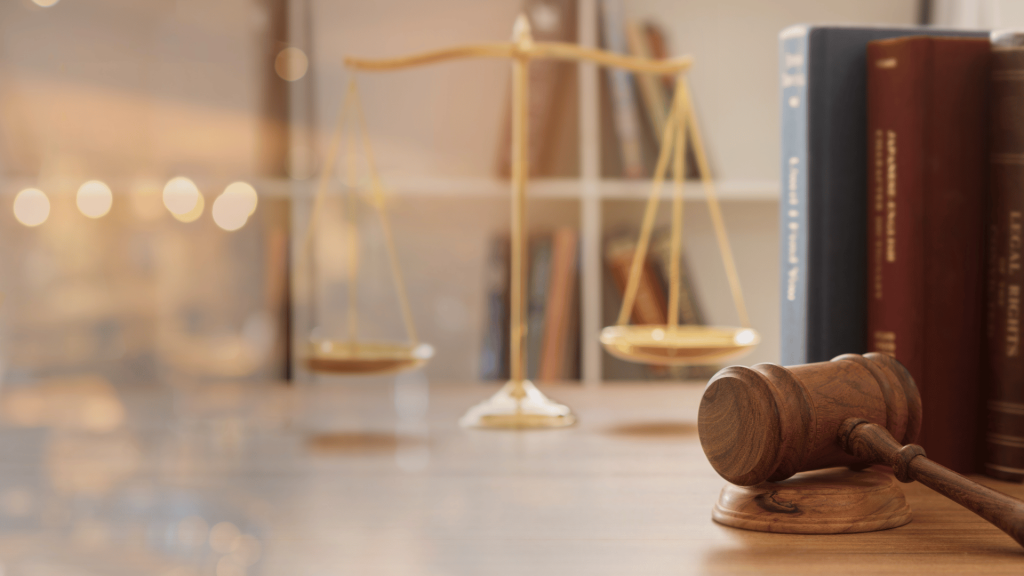 Legal justice balance on a desk with a gavel