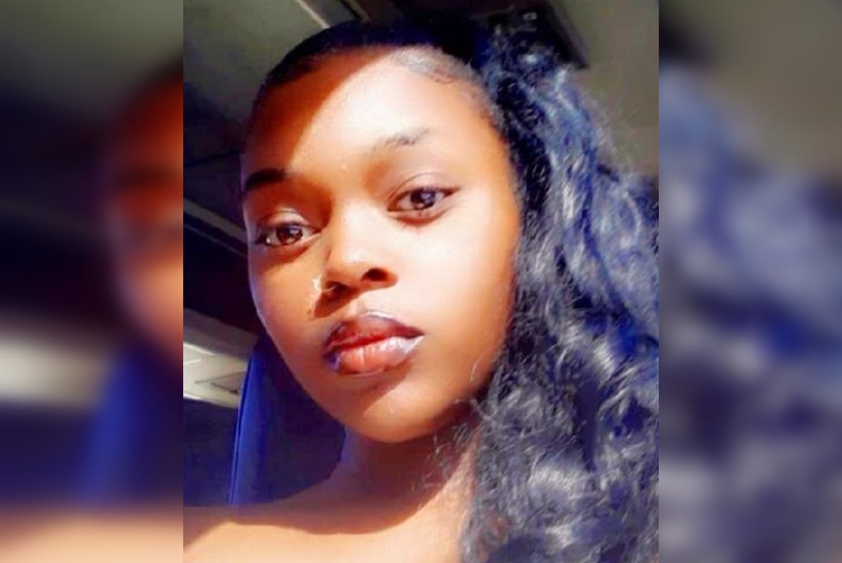 Portrait of Anaiah Walker, a young woman with long, curly hair, seeking justice for her tragic story as a victim of trafficking and violence in the Arizona foster care system.